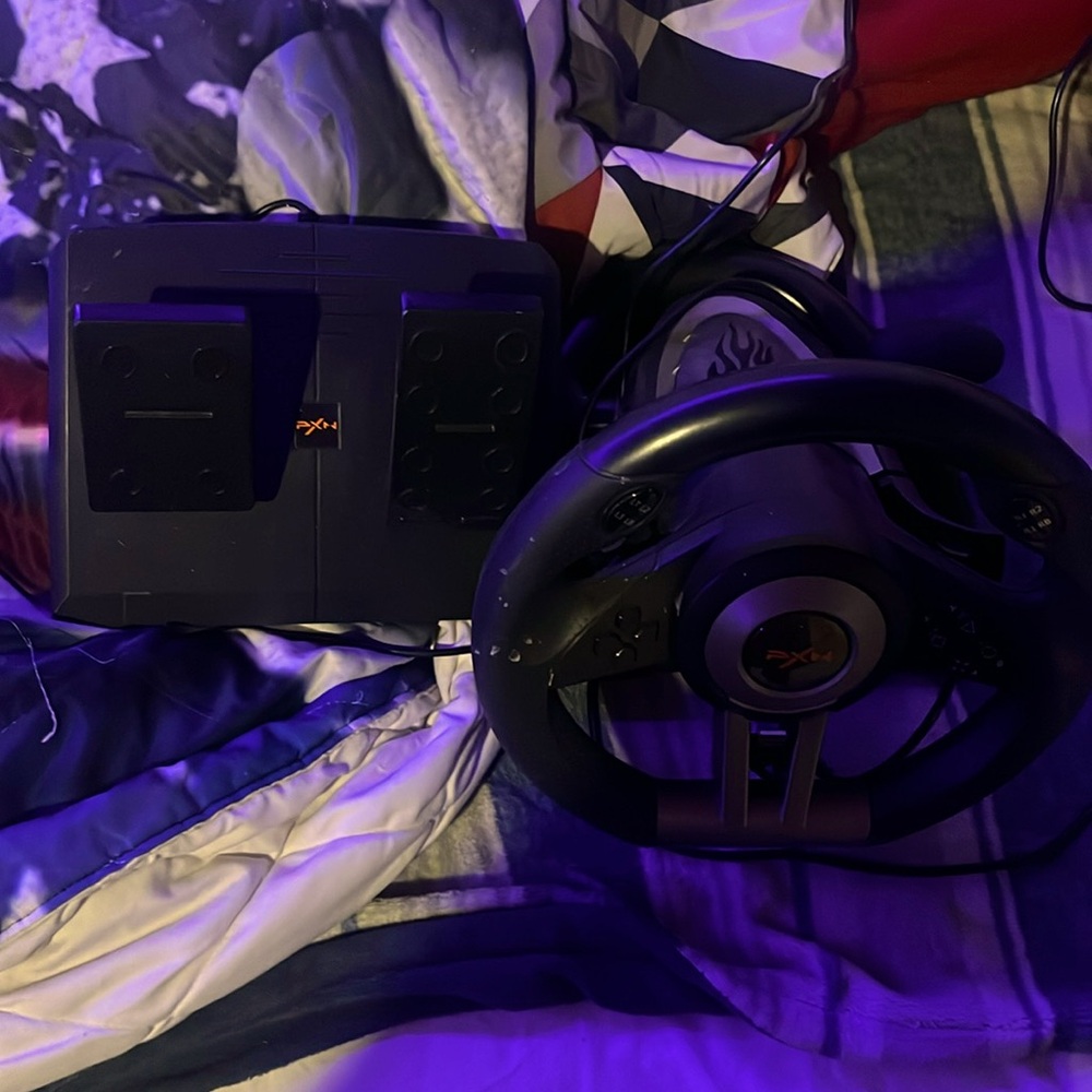 gaming pedals and steering wheel